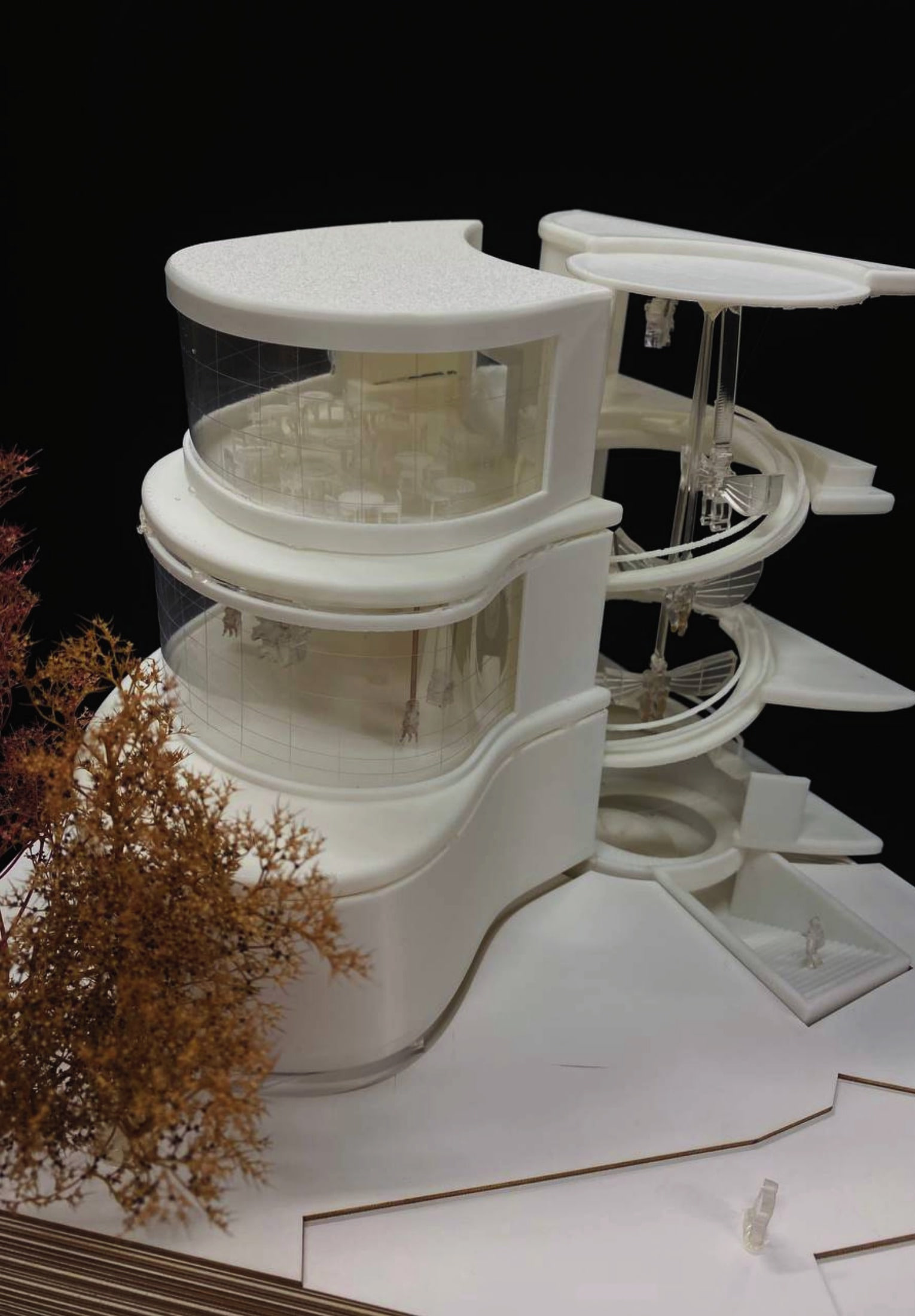 1:100 sectional model in white resin, glazed studios and acrylic spiral ramp