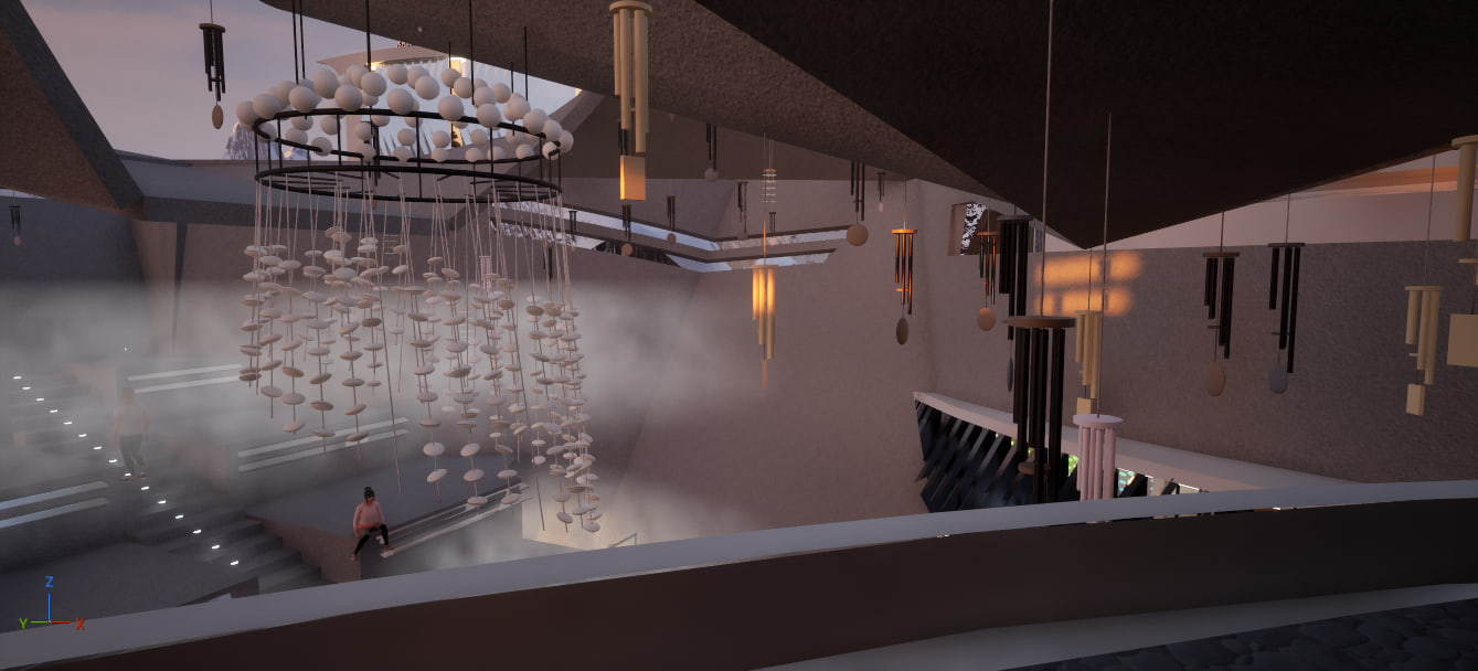 Chandelier of hanging stone discs and chimes above a misted stair hall