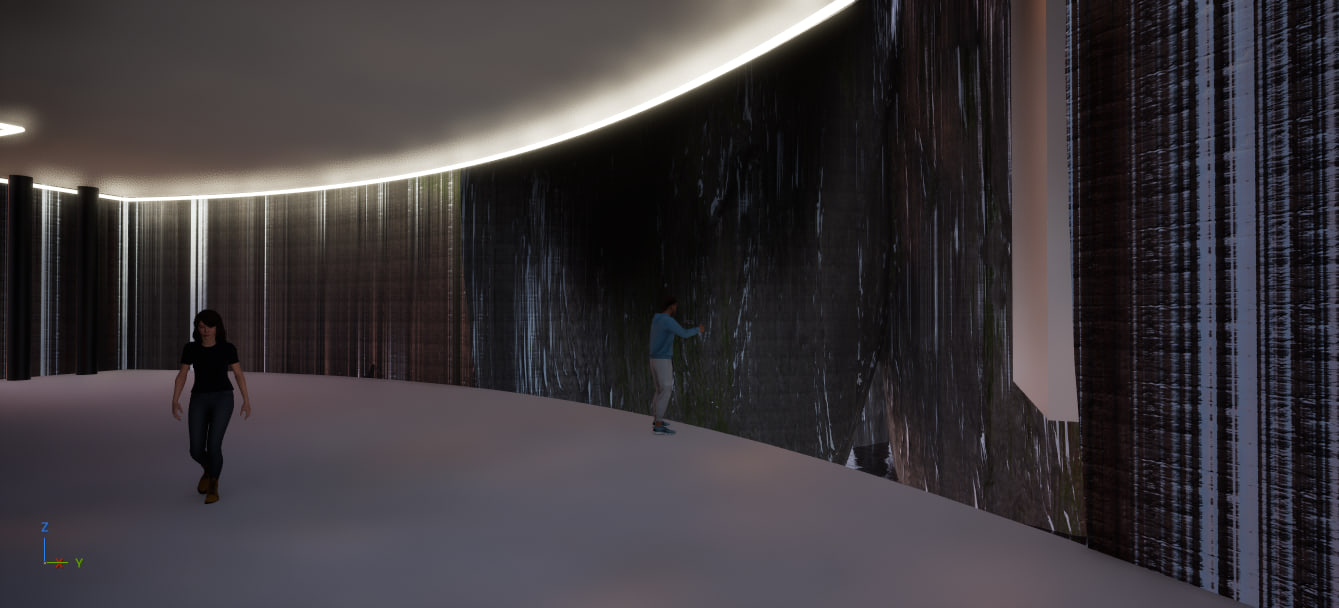 Curved gallery walled in polished black striated rock, two figures for scale